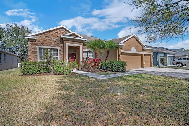 view of front of house with a front yard and a garage