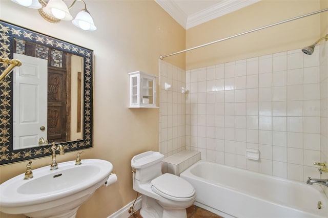 full bathroom featuring baseboards, toilet,  shower combination, crown molding, and a sink