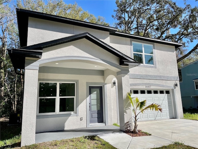 view of front of home with a garage