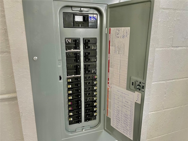 utility room featuring electric panel