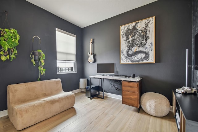 office space with light hardwood / wood-style flooring