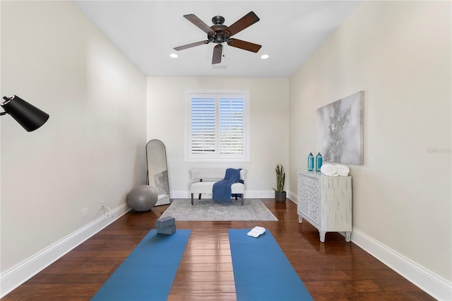 exercise area with recessed lighting, wood finished floors, baseboards, and ceiling fan