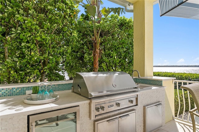 view of patio with a sink, grilling area, wine cooler, and area for grilling