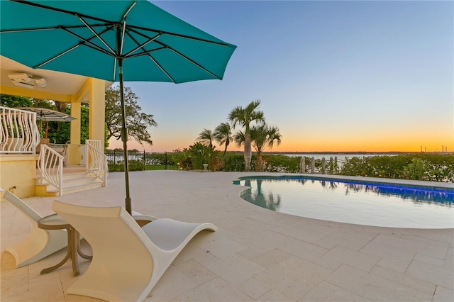 outdoor pool featuring a patio