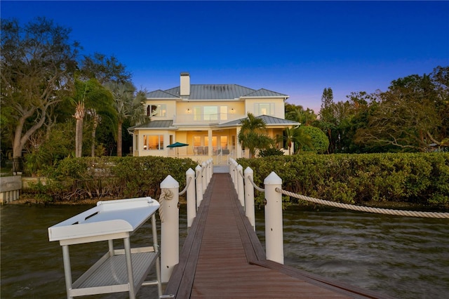 view of dock with a water view