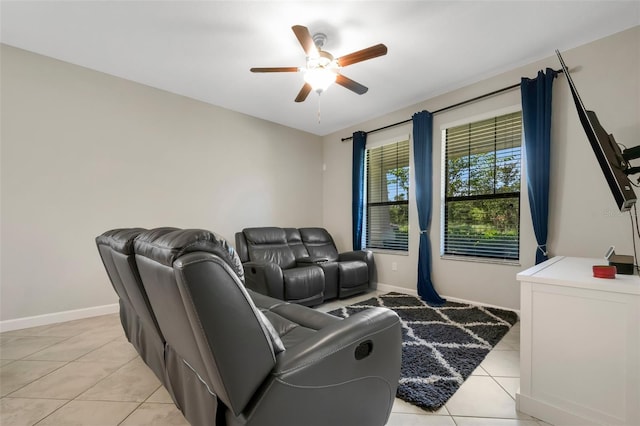 tiled living room featuring ceiling fan