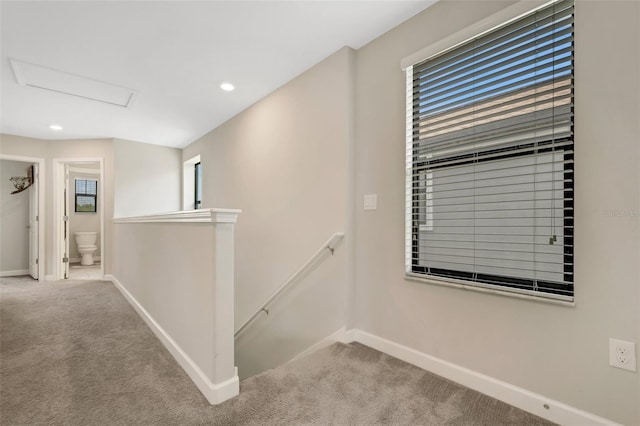 hallway with carpet