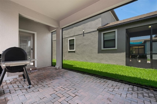 view of patio / terrace with a grill