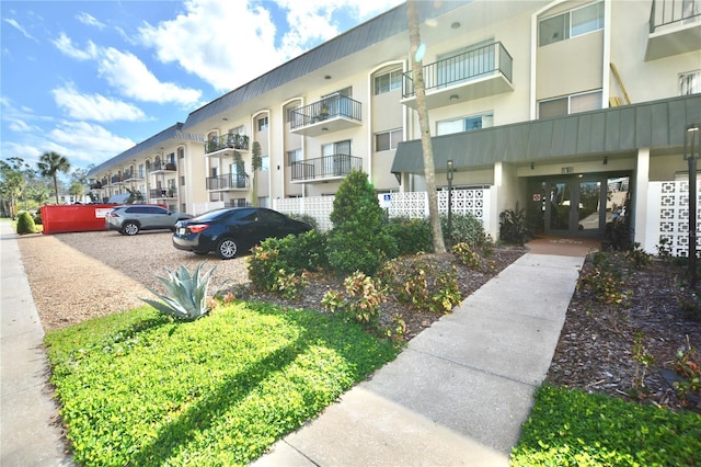 view of building exterior with a residential view