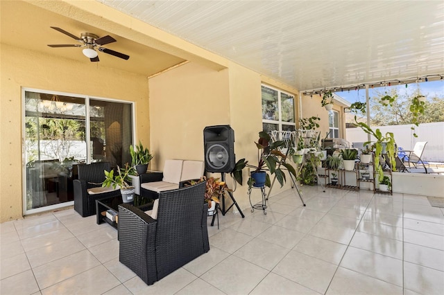 view of patio / terrace featuring ceiling fan