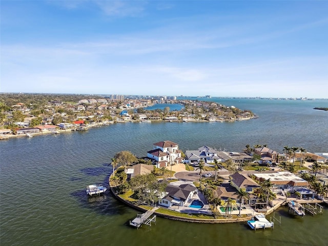 bird's eye view with a water view and a residential view