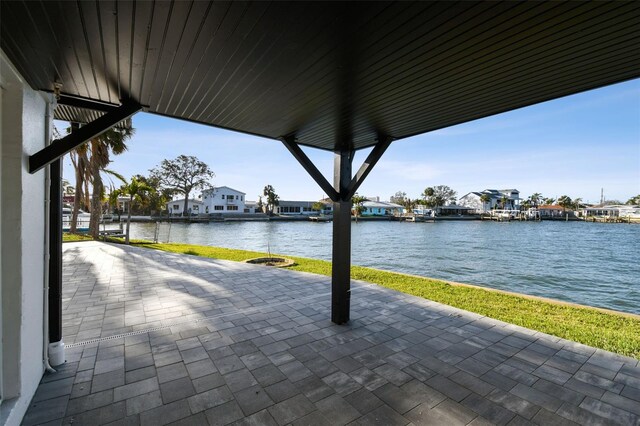 view of patio featuring a water view