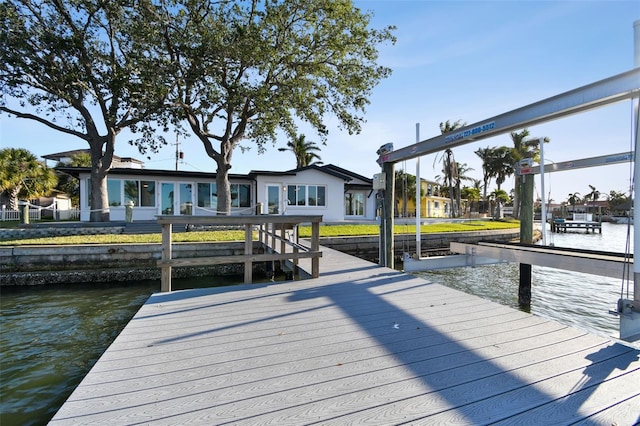 dock area with a water view