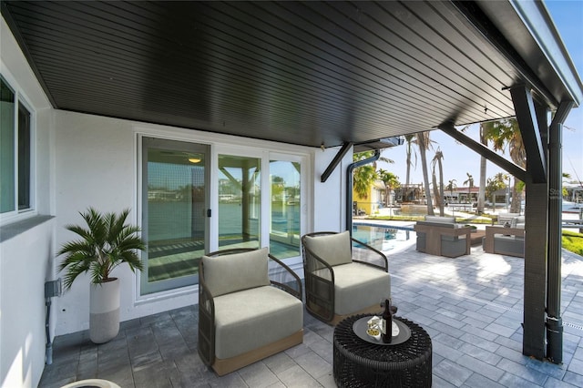 view of patio with an outdoor pool