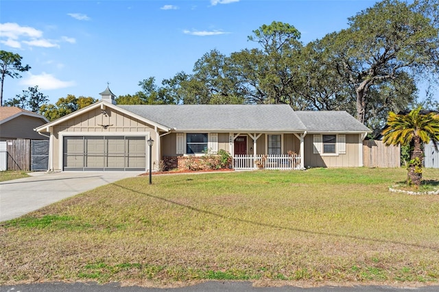 single story home with a garage and a front yard