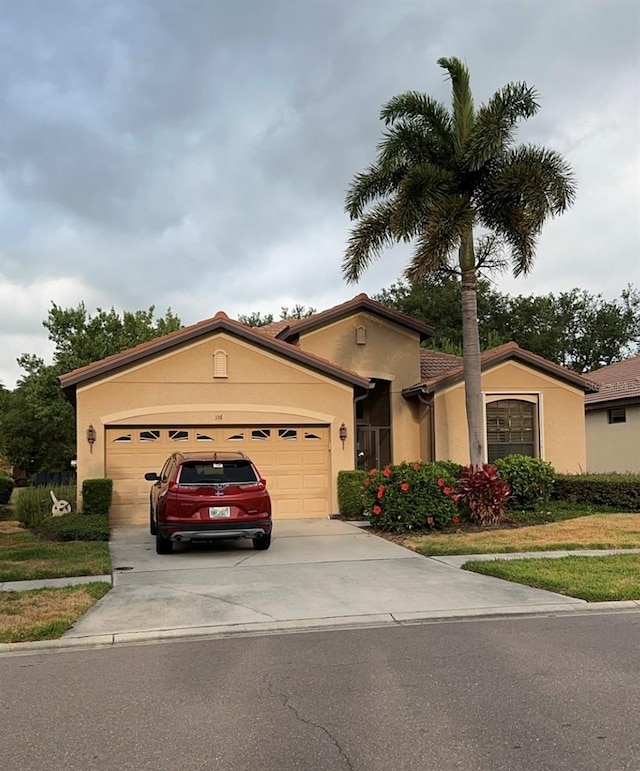 view of front of home with a garage