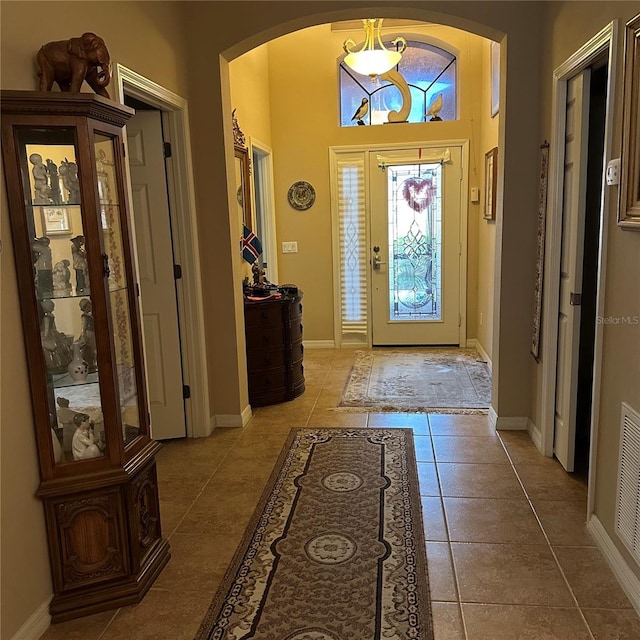 foyer with light tile patterned flooring