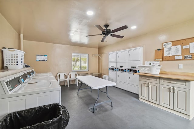 washroom featuring ceiling fan, stacked washer / drying machine, and washing machine and dryer