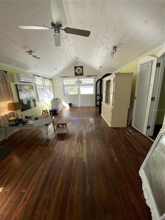 unfurnished living room featuring wood ceiling, a wall mounted air conditioner, vaulted ceiling, dark hardwood / wood-style flooring, and ceiling fan