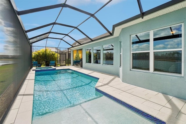 view of pool featuring a lanai and a patio area