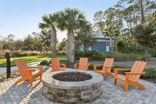 view of patio / terrace featuring a fire pit