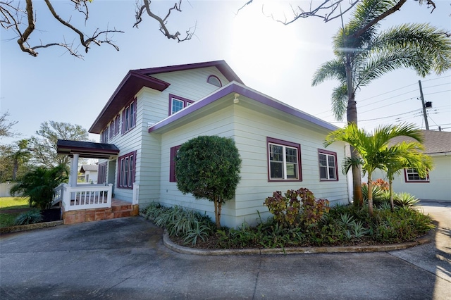 view of home's exterior featuring covered porch