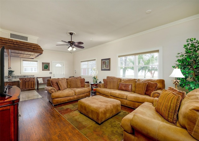 living room with ceiling fan, ornamental molding, and dark hardwood / wood-style flooring