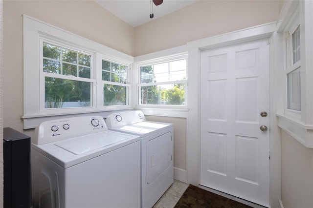 laundry area featuring ceiling fan and separate washer and dryer