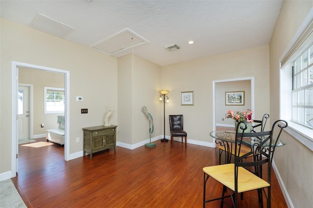 living area with dark hardwood / wood-style floors