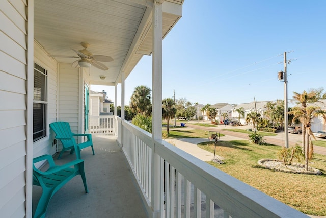 balcony featuring ceiling fan and covered porch