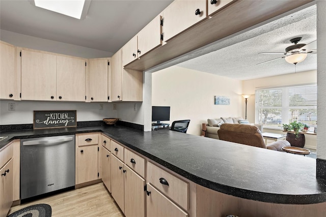 kitchen with ceiling fan, dishwasher, kitchen peninsula, and light wood-type flooring