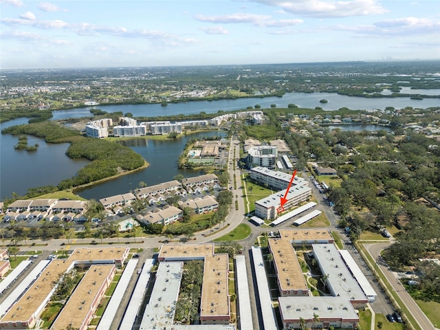 birds eye view of property featuring a water view