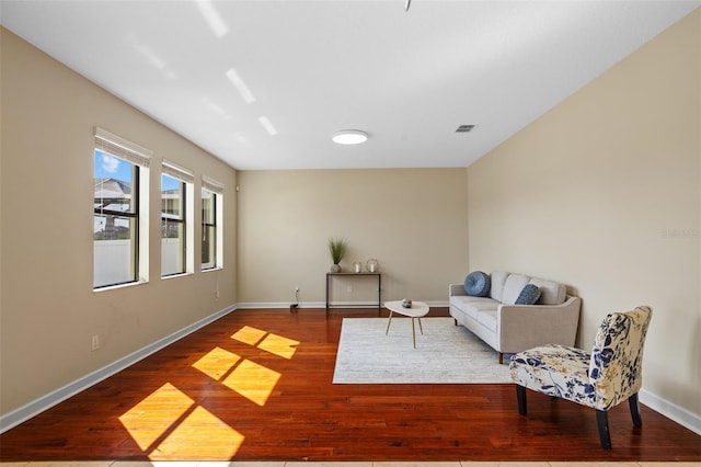 sitting room featuring hardwood / wood-style floors