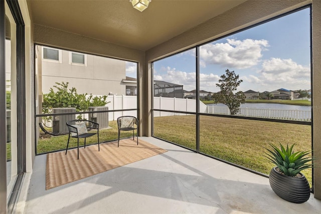 19429 Paddock View Dr, Tampa, FL 33647 - unfurnished sunroom with a water view and a residential view