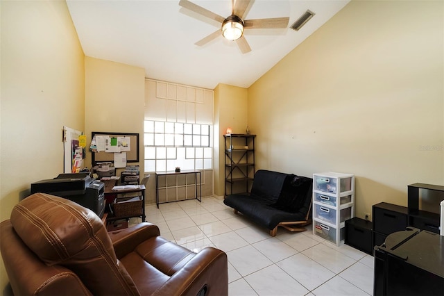 tiled living room with high vaulted ceiling and ceiling fan