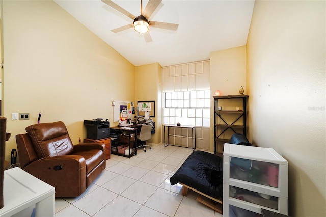 tiled home office featuring ceiling fan and lofted ceiling