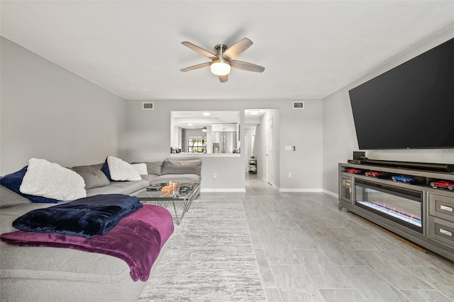 living room featuring ceiling fan