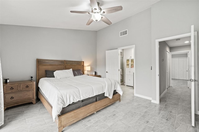 bedroom with vaulted ceiling and ceiling fan