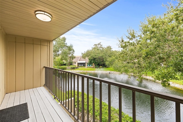 balcony featuring a water view