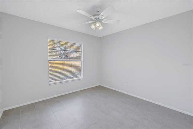 empty room featuring ceiling fan