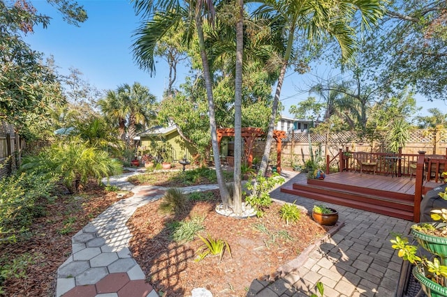 view of yard with a wooden deck