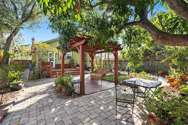 view of patio / terrace with a pergola and a deck