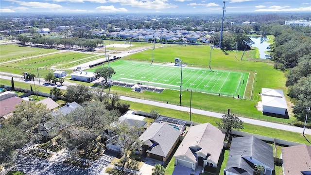 bird's eye view featuring a water view and a residential view