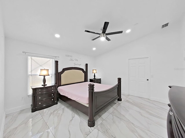 bedroom with lofted ceiling, marble finish floor, baseboards, and recessed lighting