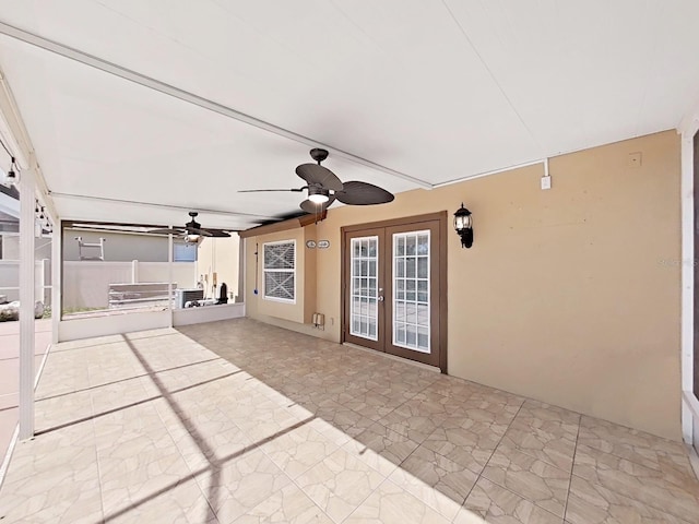 view of patio with a ceiling fan and french doors