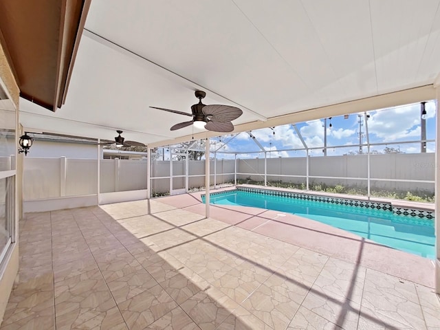 view of pool featuring a fenced backyard, a lanai, a ceiling fan, a fenced in pool, and a patio area