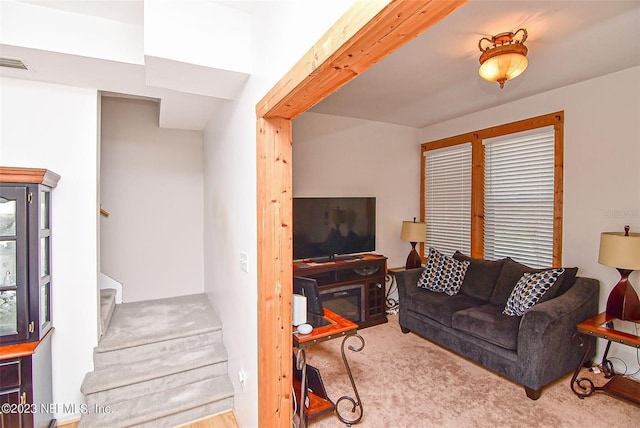 living room with light colored carpet