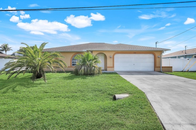 ranch-style home with a garage and a front lawn