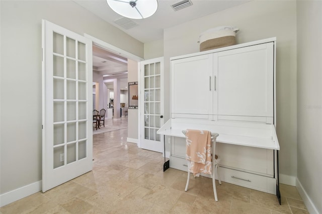 office area featuring baseboards, visible vents, and french doors