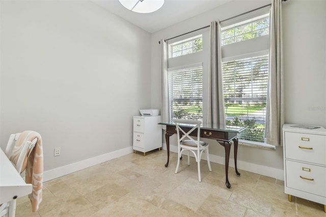 office area featuring baseboards